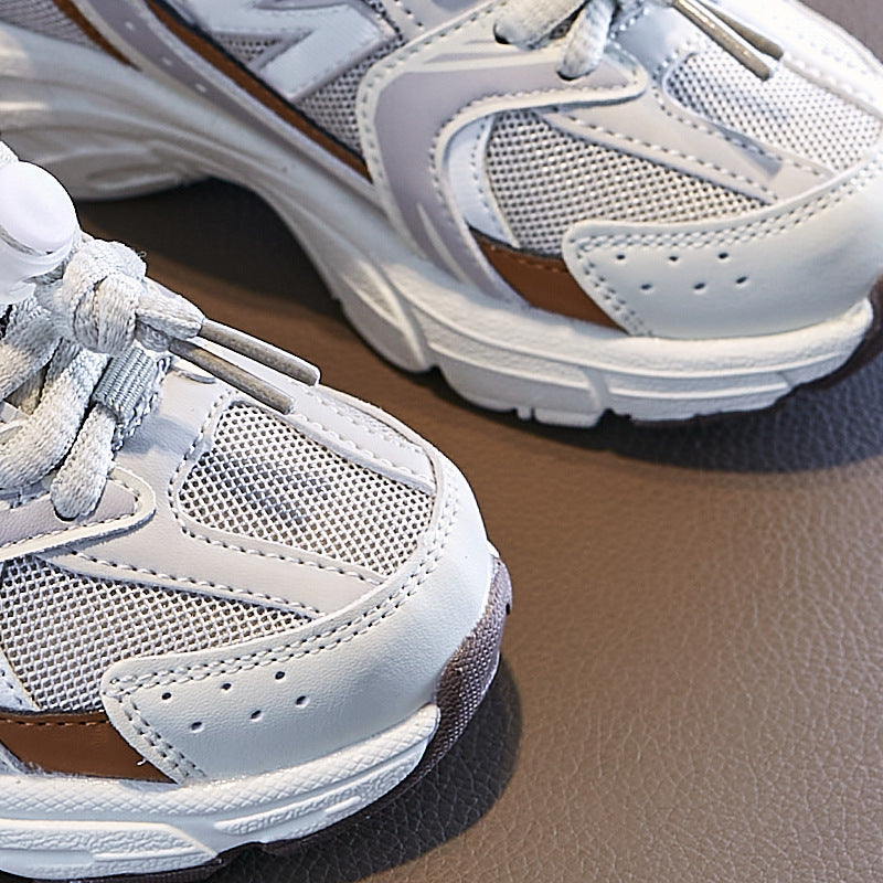New balance Children's shoes wholesale 2025 spring and autumn new girls' parent-child sneakers four seasons boys' dad shoes children's casual shoes